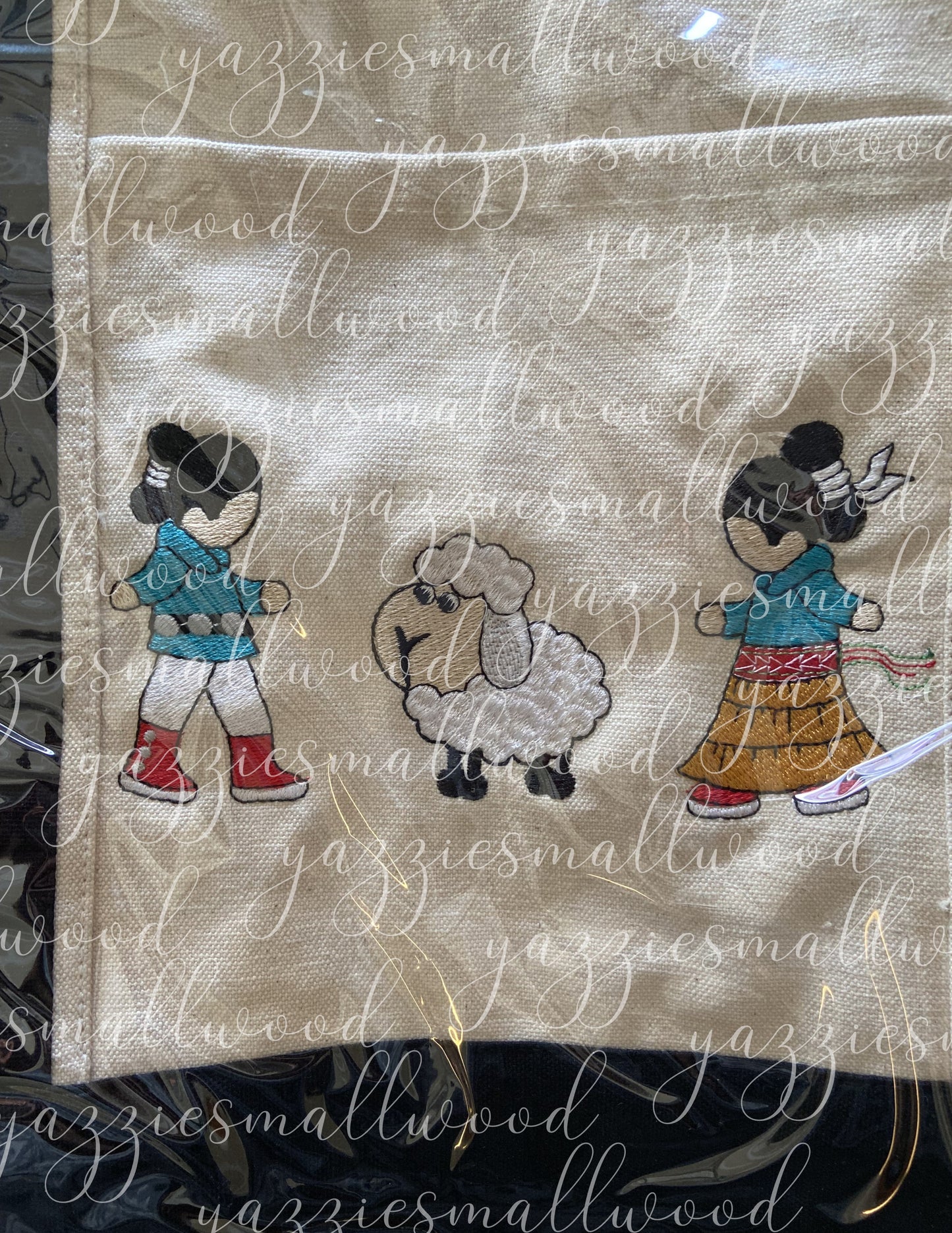 Navajo boy and girl in Traditional Attire with their sheep tote