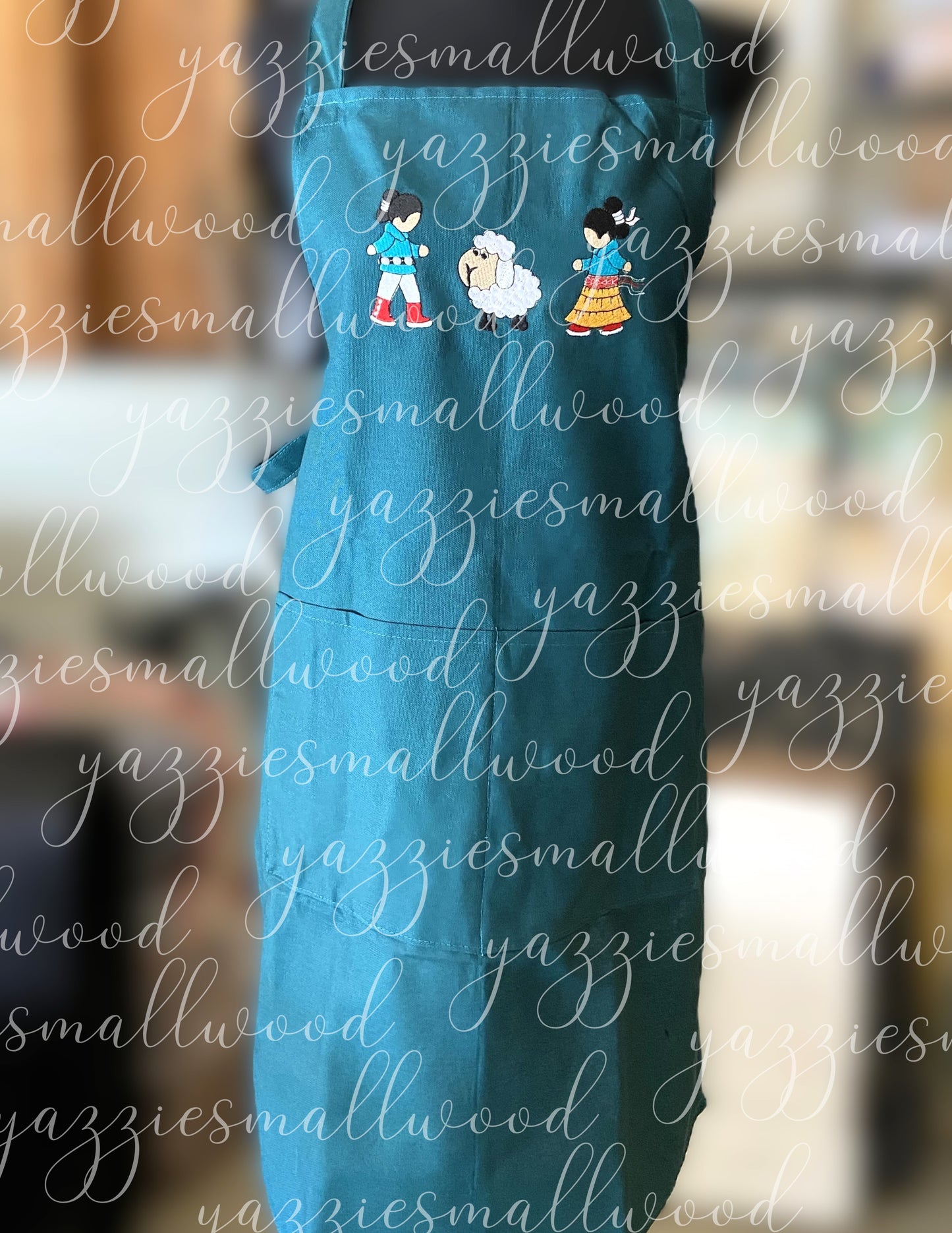 Navajo boy and girl in Traditional Attire with their sheep Apron