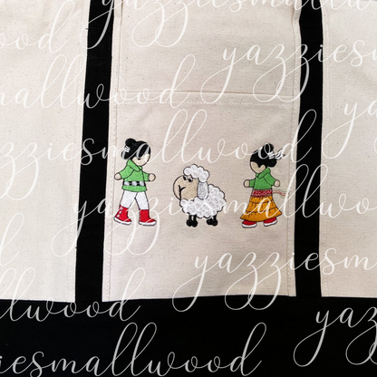 Navajo boy and girl in Traditional Attire with their sheep tote